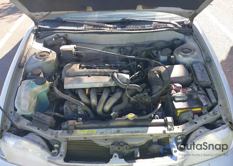 1999 Toyota Corolla Ce/Le из США, поврежденный, VIN 2T1BR12E2XC747502